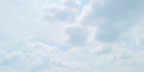 blue sky background with white clouds. White cumulus clouds formation in blue sky. White clouds and blue sky.  Panorama of blue sky with white clouds in sunny