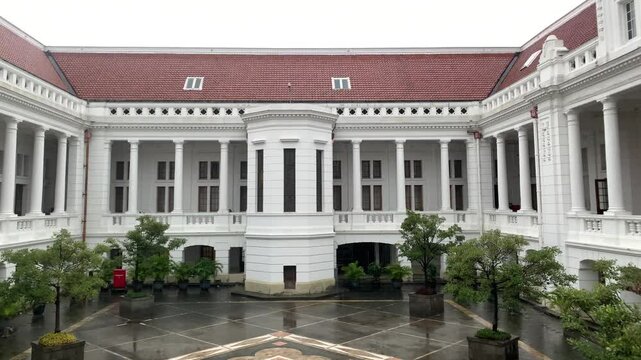 Jakarta, Indonesia - July 6, 2024: Rainy Museum Bank Indonesia at Kota Tua Jakarta. Jakarta Old Town or Kota Tua is a famous tourist destination, a place that surrounded by heritage old buildings.
