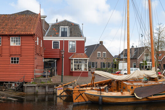 Old harbor in the fishing village Spakenburg with old traditional wooden botter fishing boat.