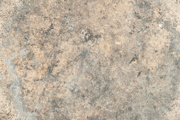 Texture of old plaster. Peeling weathered plaster on an old wall