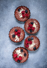 chocolate tartlets, stuffed with cottage cheese and berries, breakfast, homemade, no people,