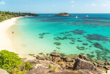Fototapeta premium Picturesque tropical sandy Anchor Beach with turquoise water on Lizard Island. Lizard Island &nbsp;is located on Great Barrier Reef in north-east part of Queensland, Australia 