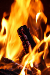 Burning Wood With Flames And Embers In Horizontal And Vertical Orientation