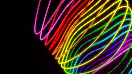 Abstract lines made with light painting with the colors of the rainbow on black background.Stack of rolls of multi-colored fabrics.Abstract lgbt symbol, rainbow pride sign waves floating in space. 