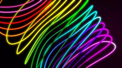 Abstract lines made with light painting with the colors of the rainbow on black background.Stack of rolls of multi-colored fabrics.Abstract lgbt symbol, rainbow pride sign waves floating in space. 