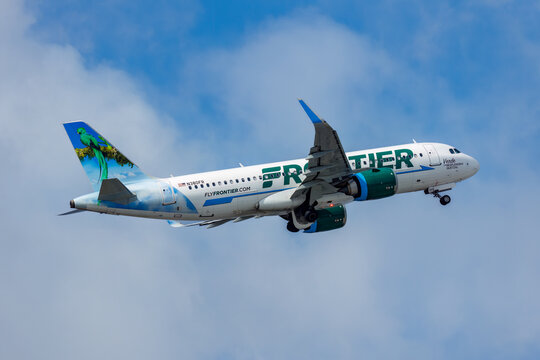 Frontier airlines Airbus shortly after takeoff with gear halfway retracted