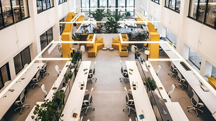 Yellow and White open space office interior with city view, daylight, furniture and equipment. 3D Rendering