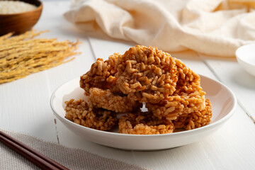 Sweet Crispy Rice Cracker with Cane Sugar Drizzle.Thai snack.made from Glutinous Rice.
