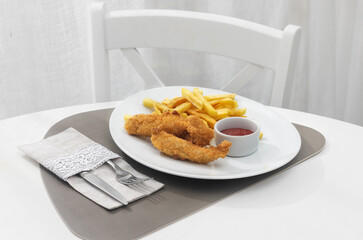 Fried Fish Sticks with French Fries. Fish Fingers. Fish Sticks with fried potato