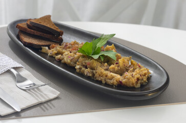 Eggplant caviar in plate. Vegan snack food