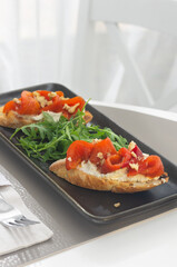 bruschetta with red sweet pepper close up