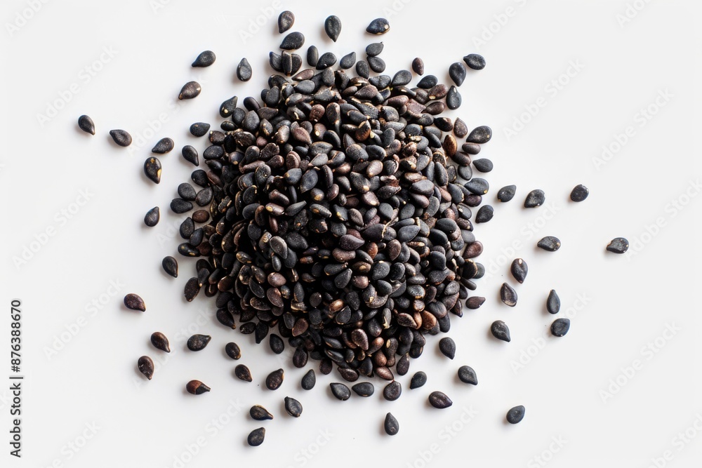 Poster a pile of coffee beans arranged on a white surface, ideal for use in food and beverage related conte