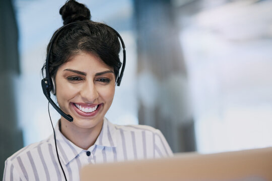 Happy, woman and online with laptop in call center for career in telemarketing, inbound and customer service. Girl, headset and consulting for multilingual technical support, translation and crm.
