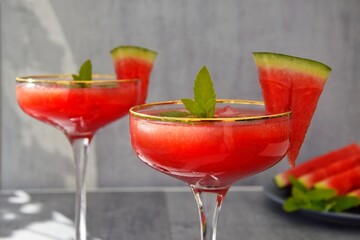 Fresh watermelon smoothie with mint and ice. A refreshing summer drink.