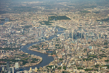 High aerial view of downtown city of London, with river Thames, the Shard, Tower bridge, HMS...