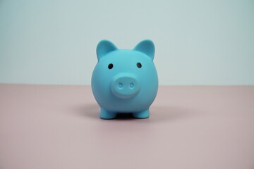 piggy bank for saving money with space for text on pink background