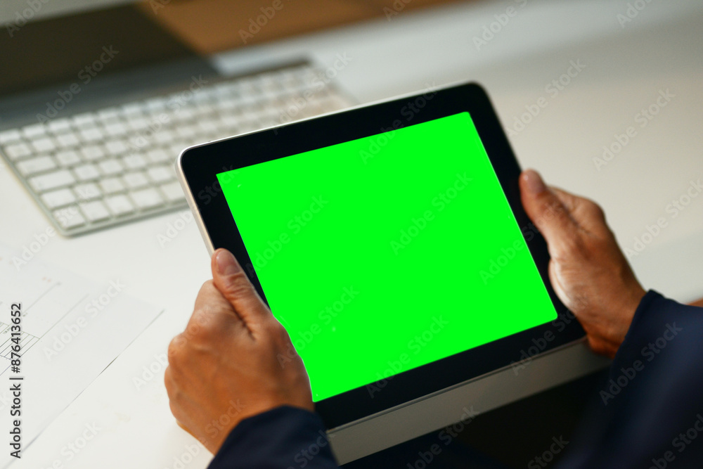 Poster office, hands and tablet with green screen in desk for mockup space, advertising and promotion. busi