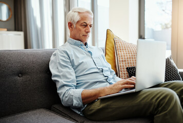 Elderly person, laptop and retirement in home for typing email, communication and reading online...