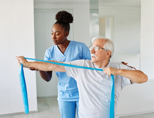 therapist senior man exercise exercising patient physical woman girl therapy care nurse recovery...