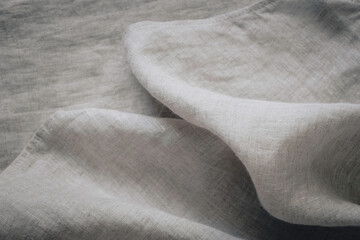 Gray linen fabric texture background. Natural linen bedding background. Top view