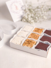 Dessert in a gift box is Bird's milk.