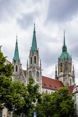 Fototapeta premium Neo-Gothic style St. Paul's Church (Paulskirche) is one of the tallest sacred buildings in Munich. St. Paul Church has a main tower 97 meters high. MUNICH, GERMANY.