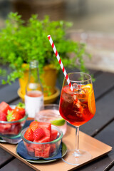 Aperol Spritz, strawberries and watermelon