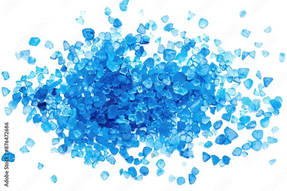 Poster a collection of blue rocks sitting on a white surface, great for use in design or photography projec