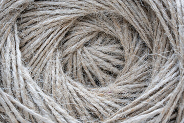 Natural, rustic rope fibers. Emphasizes the tactile quality of the material, ideal for themes related to DIY projects, rustic decor, and sustainable materials.