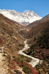 View onto the Imja Khola River, Shomare village in front of Mount Nuptse, Everest and Lhotse can be...