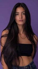 Fototapeta premium Portrait, woman in studio with waves, skincare, and facial beauty. Young model with wavy hair, natural salon cosmetics, aesthetic color dye, and shine shampoo.