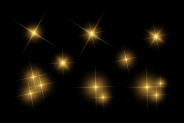 Golden sparkle  lights, flashing lights, light effects, sunlight lens flare, glowing ray beams, sparkling starsicon on black background.