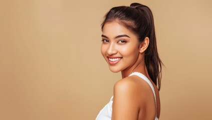 Obraz premium Beautiful Asian woman with flawless skin. Skincare concept. Beautiful young Asian woman practicing skincare. smooth face touches her healthy facial skin. Copy space for text.