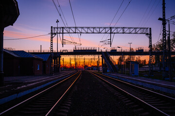 Fototapeta premium Sunset at railway station in Small Vishera, Leningrad oblast
