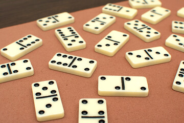 Dominoes bones on brown background