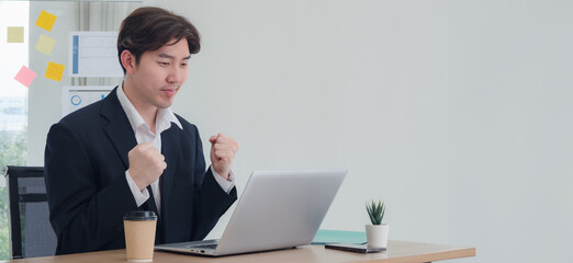 Business man manager employee asian one person sitting on desk look smile happy enjoy and...