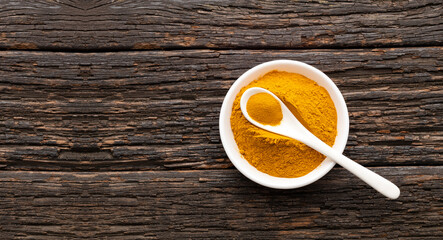 Turmeric is a very healthy species in the spoon and bowl - Curcuma longa