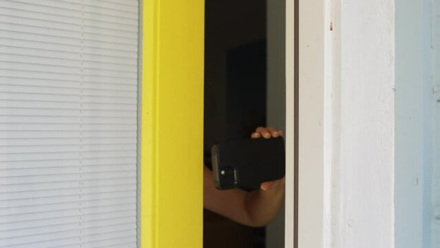 Filming through front door