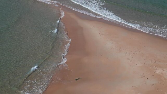 Aerial view of a  beach. Coastal feature: tombolus.