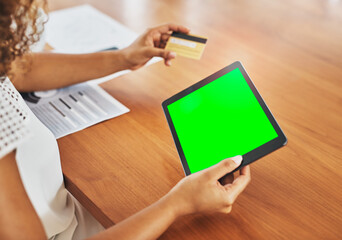 Credit card, hands and tablet with green screen, person and typing with internet, payment and fintech. Closeup, employee and consultant at desk, online banking and savings with investment and app