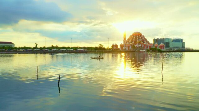 Afternoon at Losari beach, floating mosque.	