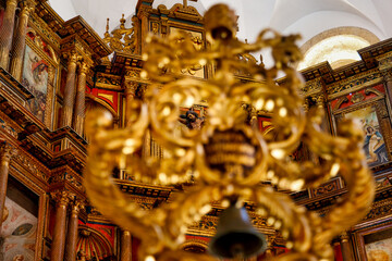 Figure of Christ seen through a golden crosier in the Cathedral of Cartagena de Indias, Colombia