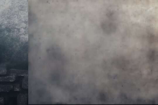 A textured grey background with a vintage feel, perfect for adding a touch of nostalgia to your design projects. 
