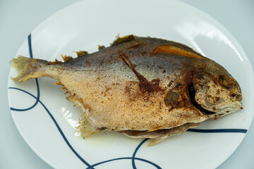 Deep Fried Pompano Fish which is a famous dish in the Philippines