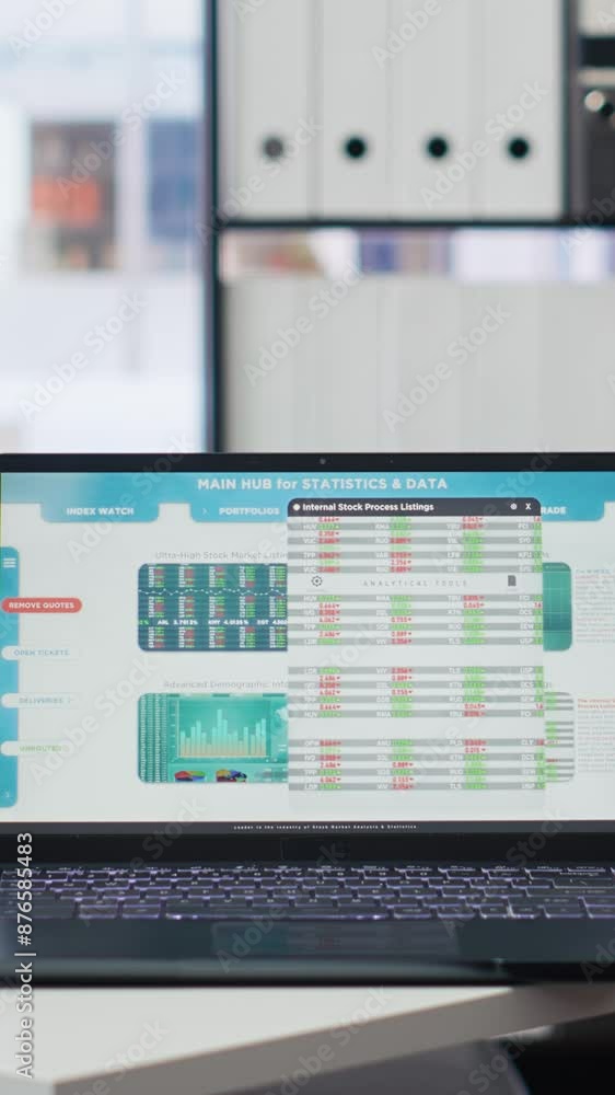 Aufkleber vertical video financial analyst workspace featuring laptop and tablet displaying stock market data 