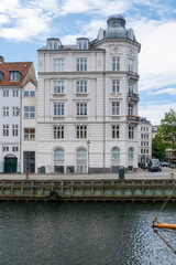 Various photos from the city center of Copenhagen the capital of Denmark harbor palace churches colorful buildings canals and general city view with cloudy weather and sunset colors