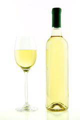 Bottle and glass of white wine isolated