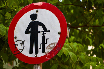 Circular Red and White Sign for Bicycle and Pedestrian Crossing