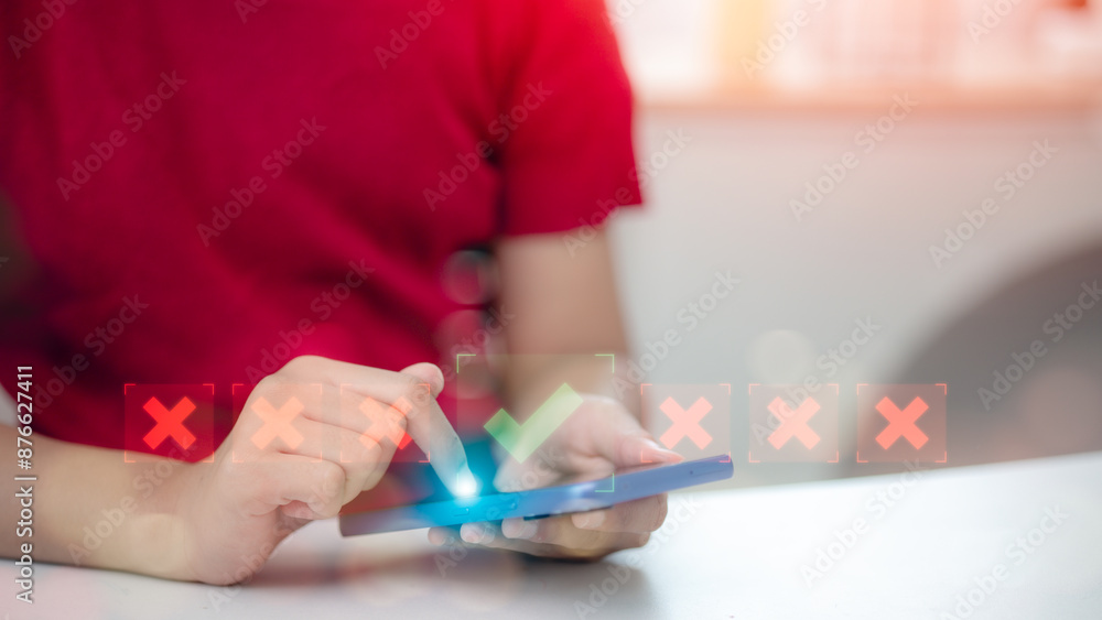 Aufkleber a person is holding a cell phone and pointing at a screen with a red x on it