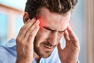 Fototapeta premium Headache, man and massage temple in home with pain for dizziness, tired or stress with glow. Red overlay, fatigue and male person with migraine for brain fog, health emergency or burnout in house